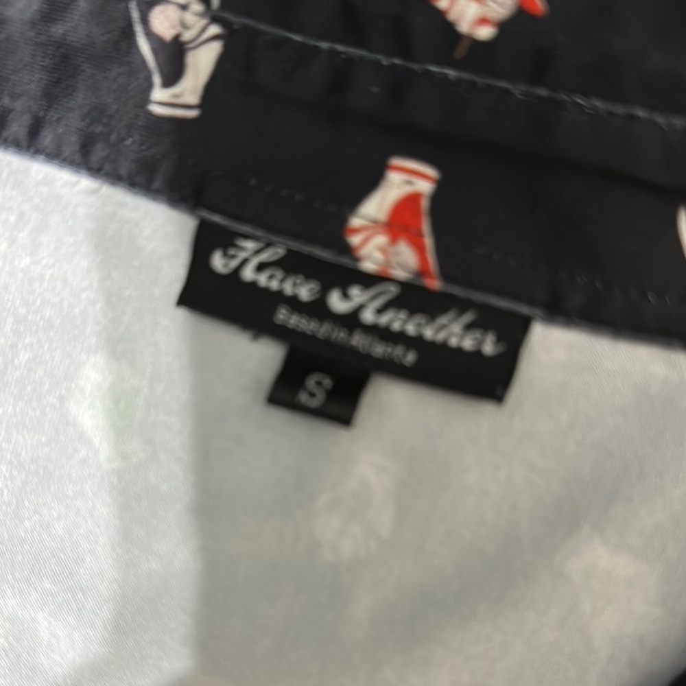 Black Golf Polo Shirt with Colorful glove Pattern - Picture 6 of 7